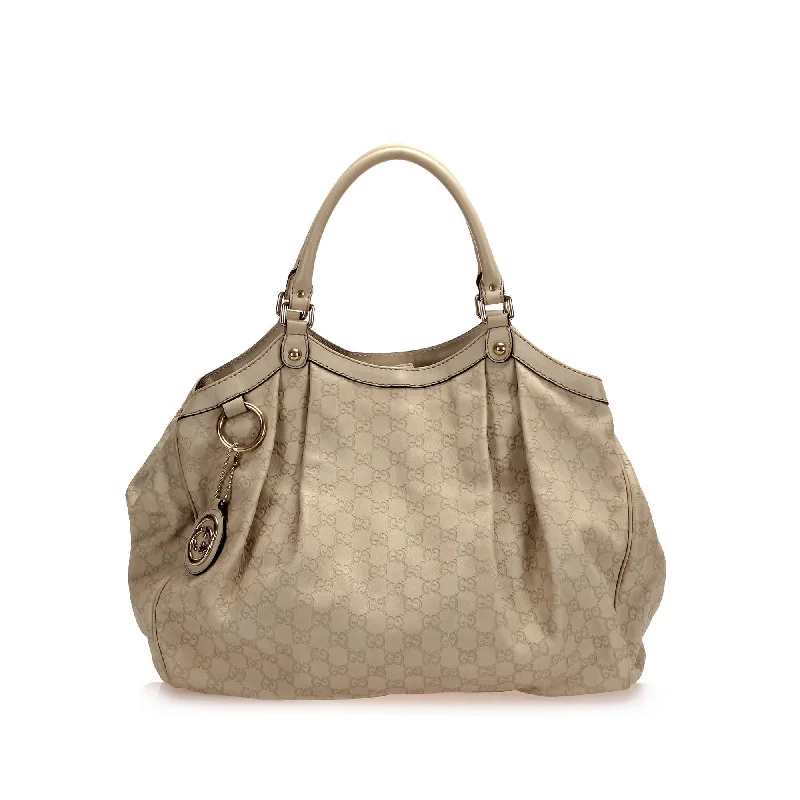 Women Gucci Sylvie bags with a monogram - embossed leatherGucci Guccissima Sukey Tote  (SHG-13347)