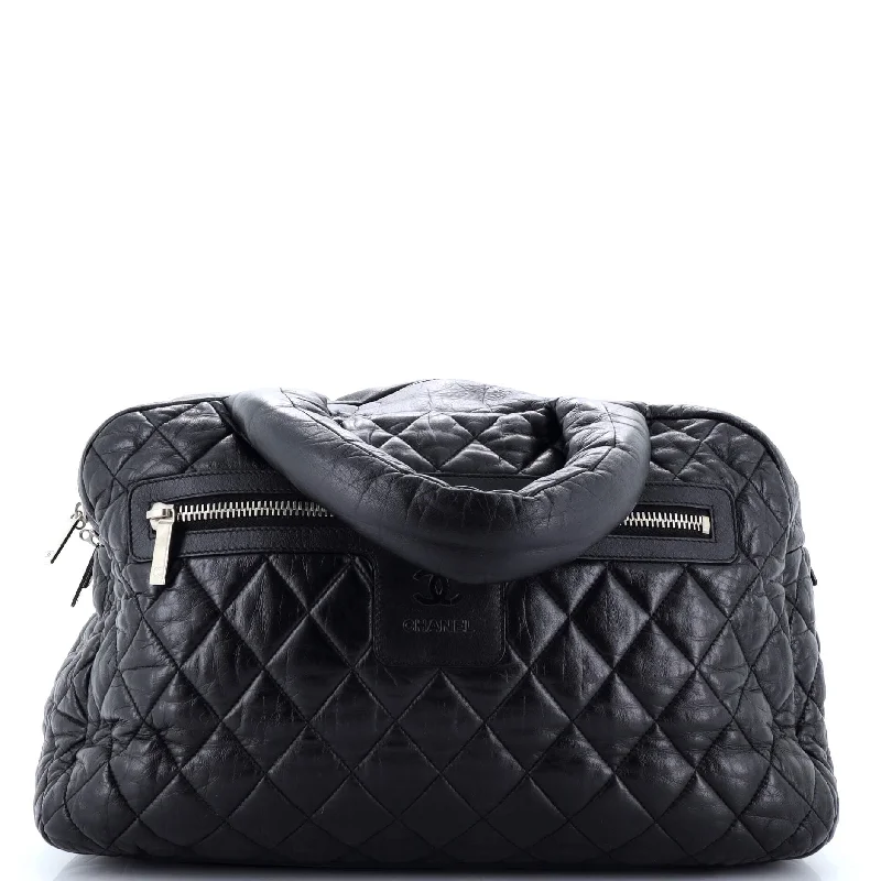 YVES SAINT LAURENT Kate bags with a monogram - embossed leather surfaceCoco Cocoon Bowling Bag Quilted Lambskin Large