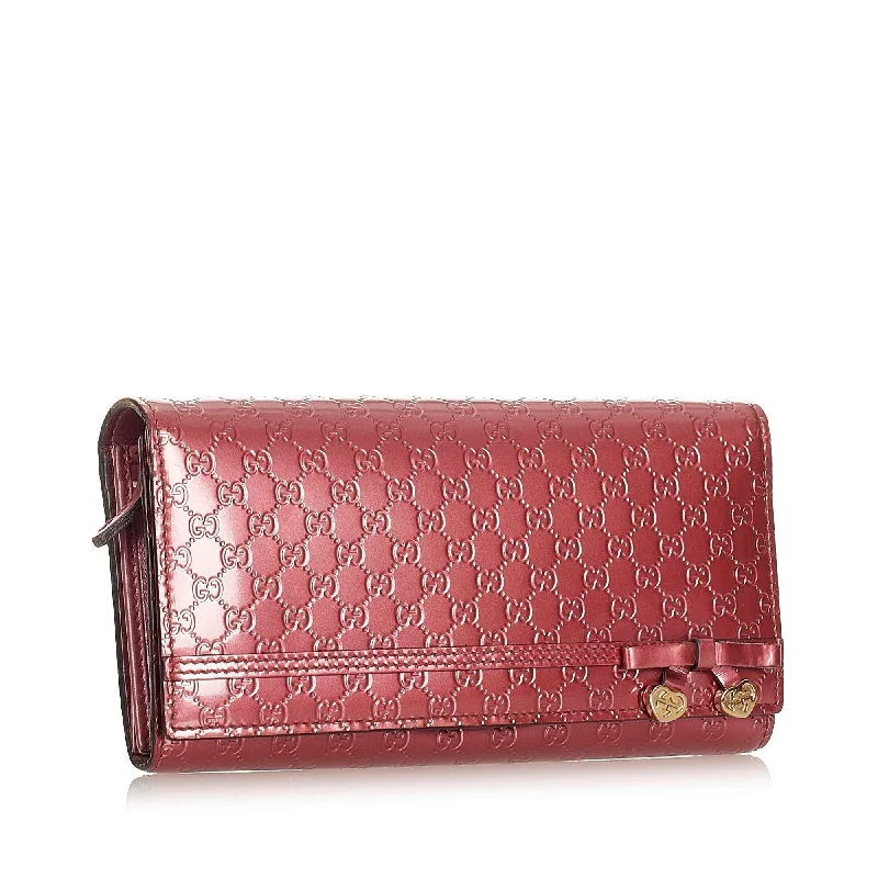 Gucci handbags for women with a beaded trimGucci Microguccissima Patent Leather Long Wallet (SHG-22201)