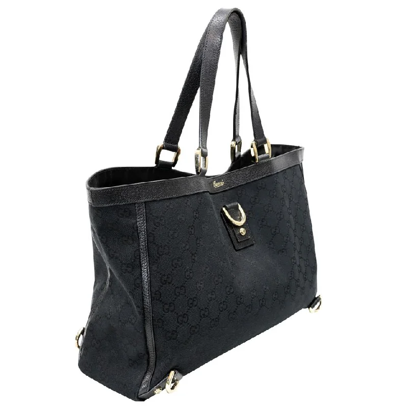 Women Gucci bags with a snap - button closure and a decorative charmGucci Signature GG Monogram D Ring Black Canvas Tote GG-B0512P-0002