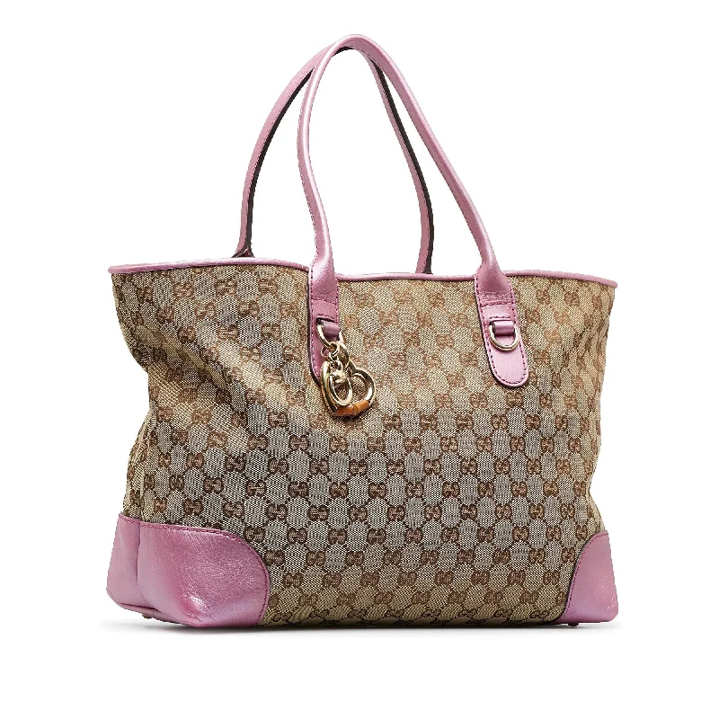 Gucci backpacks for women with a multi - pocket designGucci GG Canvas Heart Bit Tote (SHG-8tNWwL)