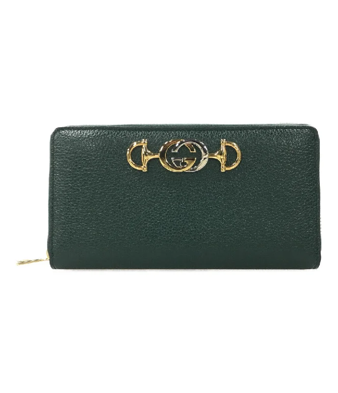 Women Gucci tote bags in GG Supreme canvas for a branded feelGucci Dark Green Leather Clutch with Gold Hardware