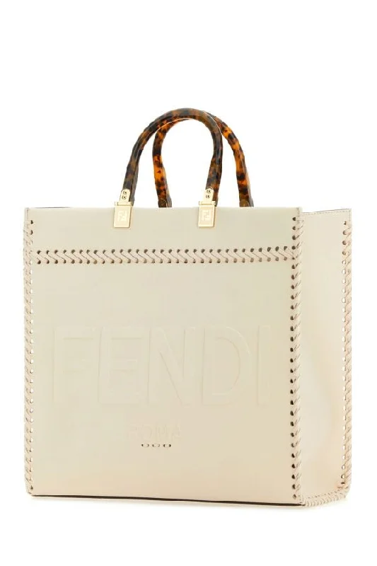 Fendi backpacks with a sleek, modern design and a matte finishFendi Woman Ivory Leather Medium Sunshine Shopping Bag