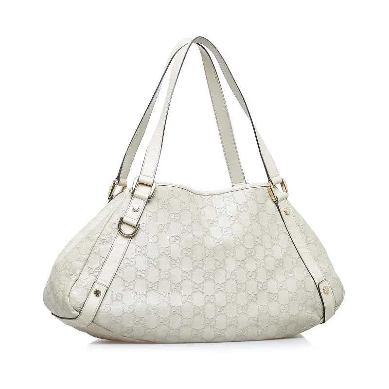 Gucci backpacks for women with a hidden back pocketGucci Guccissima Abbey D-Ring Tote (SHG-UaBhYb)