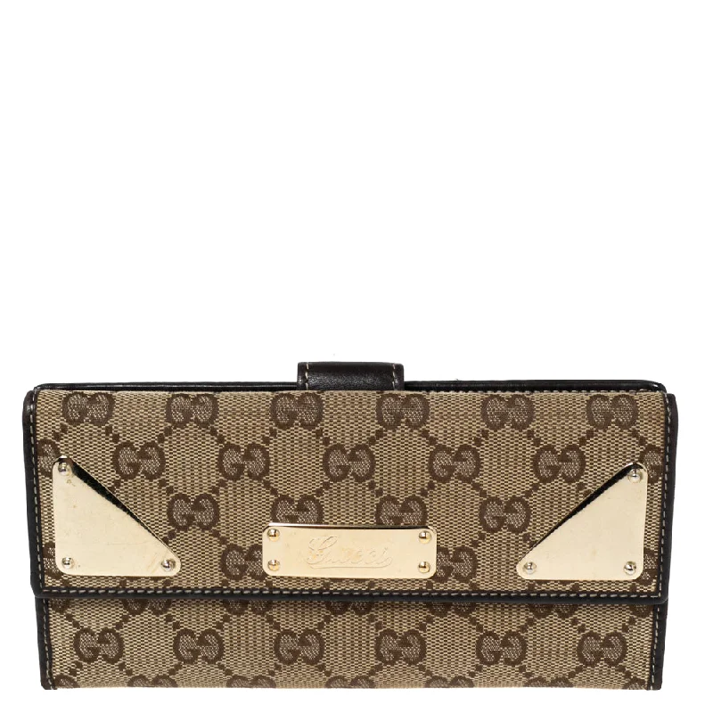 Women Gucci bags with a snap - button closure and a decorative charmGucci Dark Brown/Beige GG Canvas and Leather Indy Continental Wallet