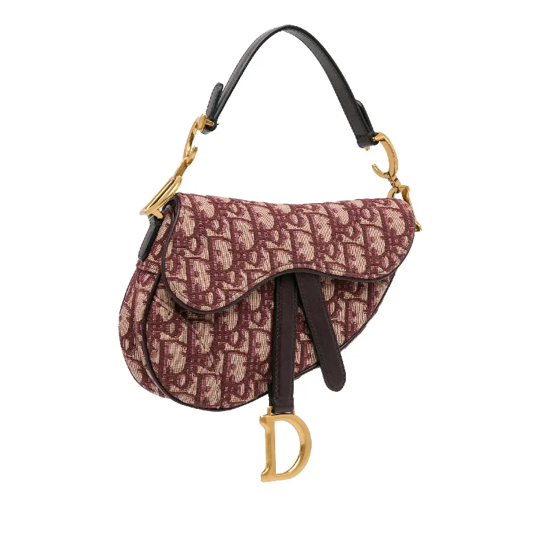 Trendsetting Christian Dior crossbody bags with a colorful strapDior Mini Oblique Saddle (5lm2Ih)